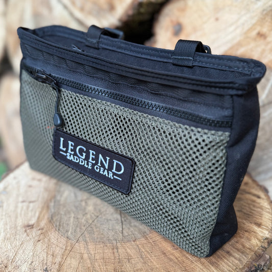 Side Zip Pouch. Spacious main compartment with an additional secure zippered side pocket.